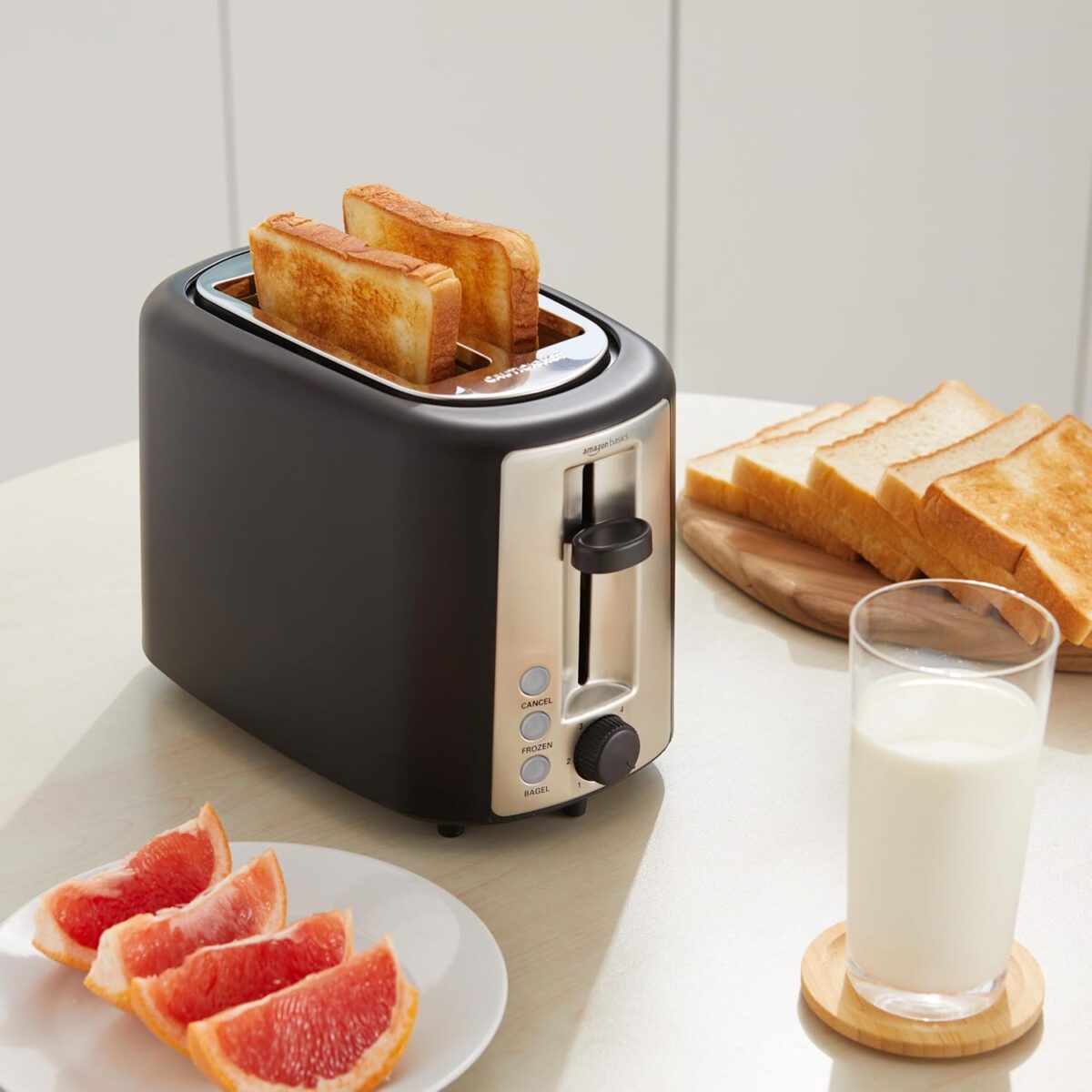 Amazon Basics 2 Slice Toaster, With 6 Browning Settings, Extra Wide Slots For Bagels and Special Breads, Removable Easy-to-Clean Crumb Tray, Cancel/Defrost/Bagel Buttons, 900W, Black & Silver - Image 6